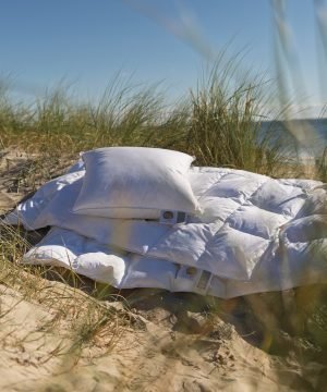 dunu-sega-femo-warm-denmark-pludmale-ar-spilvenu